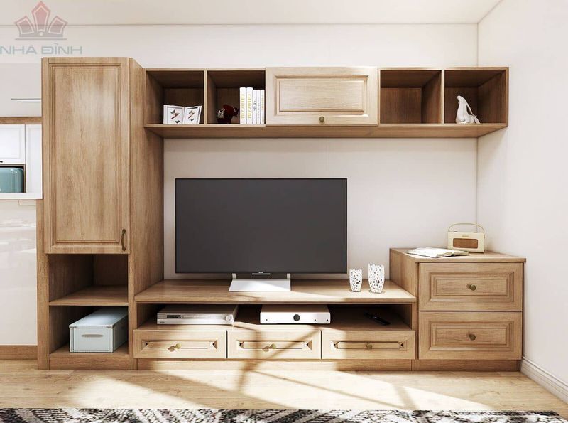 Kệ tivi gỗ đa năng tích hợp nhiều ngăn kệ, giúp bạn lưu trữ sách báo, đồ trang trí, hay thậm chí là cả dàn âm thanh một cách gọn gàng và khoa học.